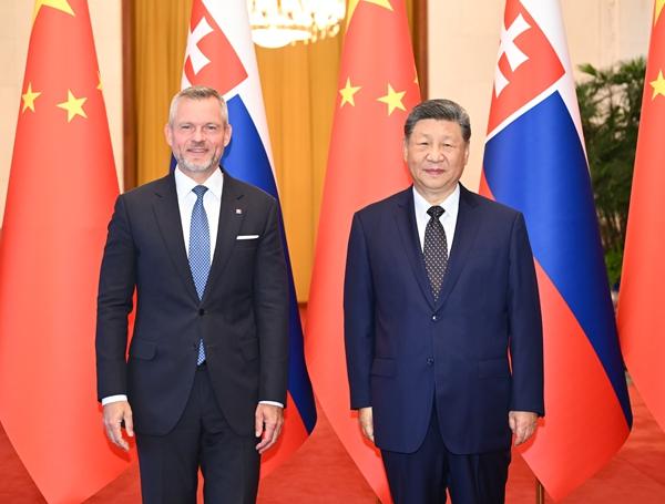 7月28日上午，国家主席习近平在北京人民大会堂同来华进行国事访问的斯洛伐克总统佩列格里尼举行会谈。新华社记者 李响/摄