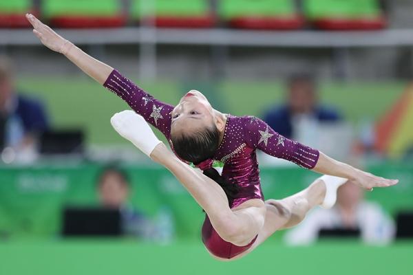2016年8月9日，巴西里约热内卢，2016里约奥运会体操女子团体决赛，中国队获得第三名。视觉中国供图