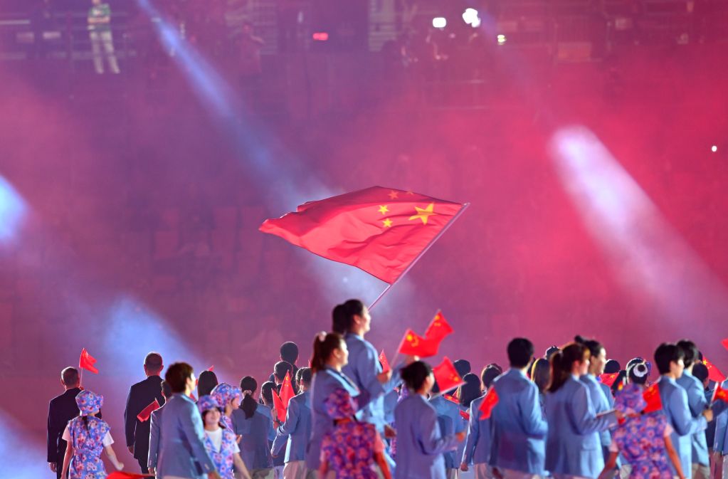 9月19日，第20届亚洲运动会开幕式在日本名古屋举行，中国体育代表团在开幕式上入场。新华社记者 刘磊 摄